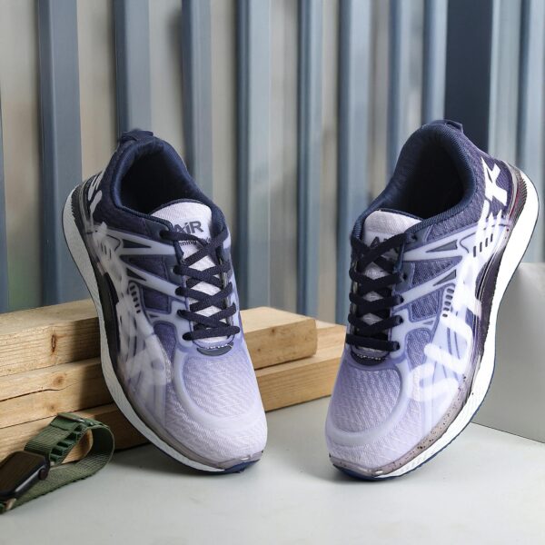 Stylish purple sports shoes displayed against a wooden and metal background in New Delhi.